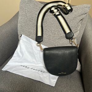 Black leather Marc Jacobs crossbody with fabric strap.